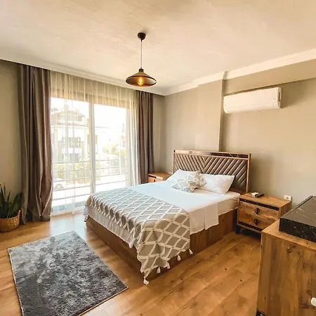 Guney Apartamento *